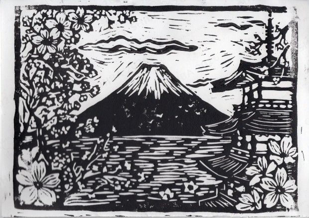 Lino print of Mt Fuji across a lake, framed by blossom and a pagoda